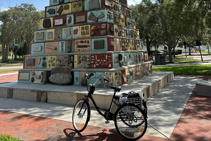 Explore Kissimmee's scenic beauty on an electrified trike navigating to stunning lakeside views local shops and refreshing spots all while enjoying the journey at your own pace.